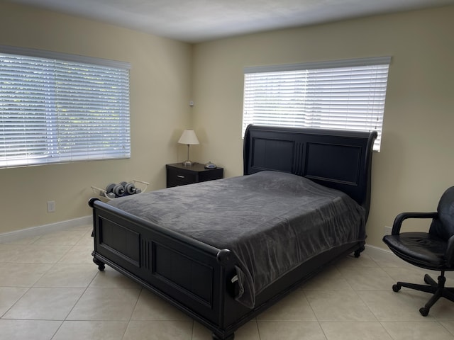 300 E Royal Palm Rd Unit 42B, Boca Raton, FL 33432 - bedroom featuring light tile patterned flooring and baseboards