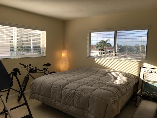300 E Royal Palm Rd Unit 42B, Boca Raton, FL 33432 - bedroom with tile patterned flooring and multiple windows