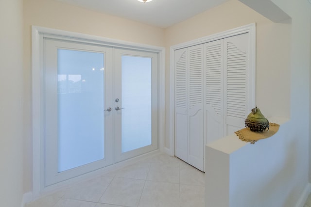 300 E Royal Palm Rd Unit 42B, Boca Raton, FL 33432 - entryway with french doors and light tile patterned floors