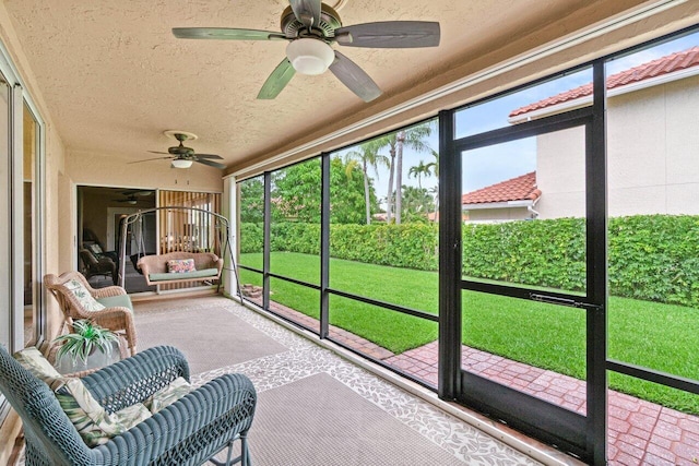 9556 E Lake Dr, Boca Raton, FL 33434 - sunroom featuring a ceiling fan