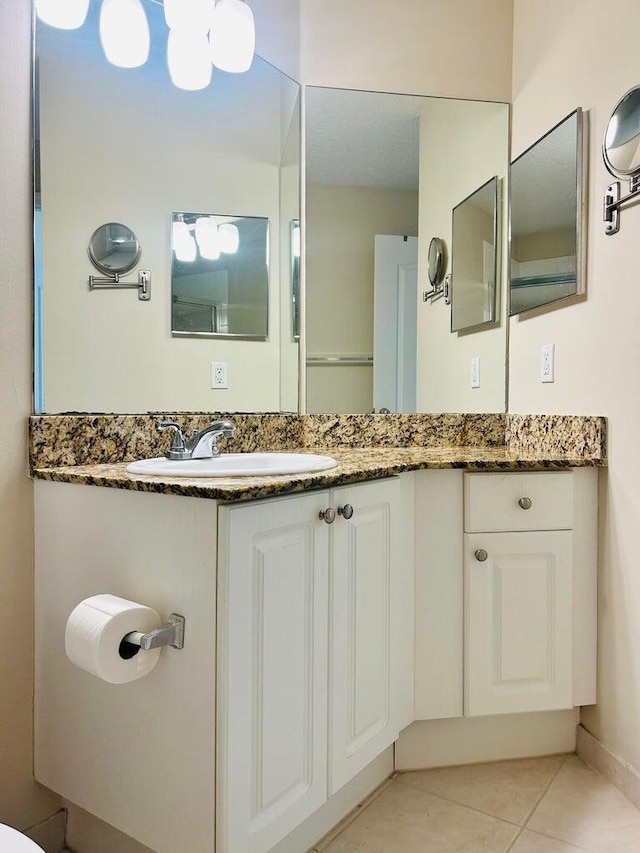 11021 Legacy Ln Unit 302, Palm Beach Gardens, FL 33410 - full bathroom with tile patterned flooring and double vanity