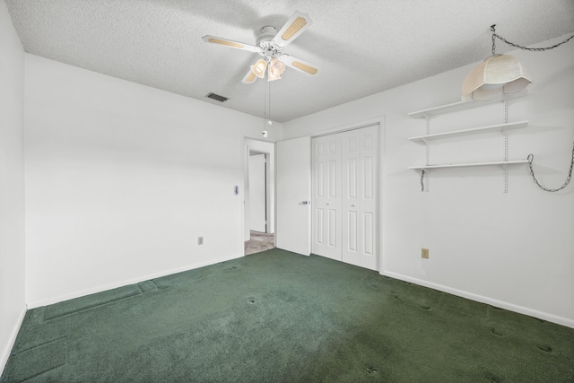5557 S Shadyside Cir, West Palm Beach, FL 33415 - unfurnished bedroom featuring baseboards, carpet floors, a textured ceiling, a closet, and ceiling fan