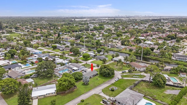 5557 S Shadyside Cir, West Palm Beach, FL 33415 - aerial overview of property's location with nearby suburban area and a large body of water
