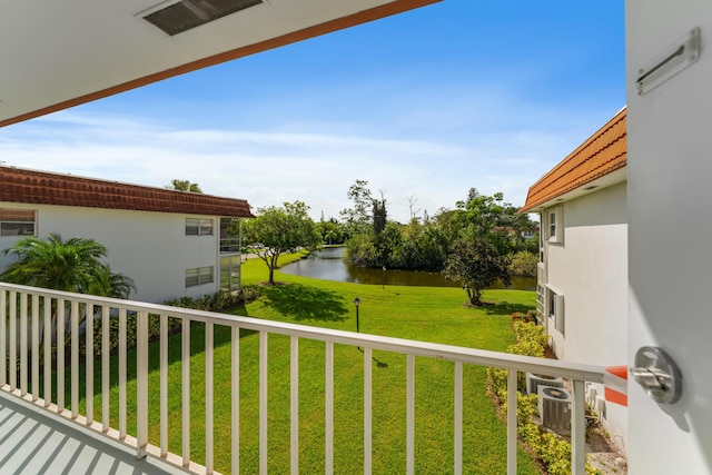 1225 NW 21st St Unit 7-710, Stuart, FL 34994 - view of green lawn with a water view and a balcony