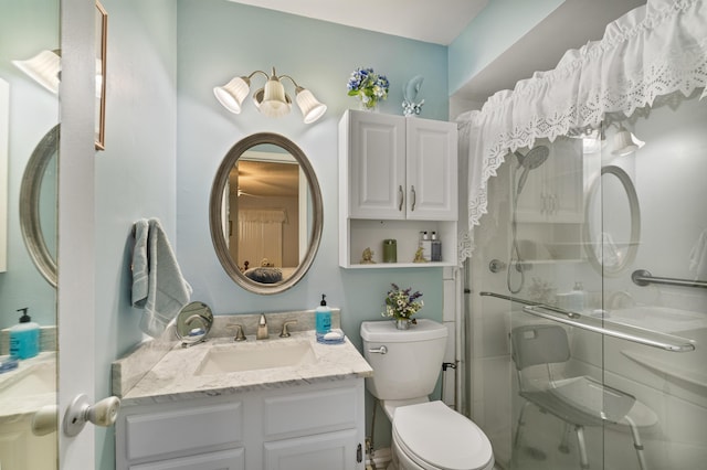1225 NW 21st St Unit 7-710, Stuart, FL 34994 - bathroom with a stall shower, toilet, and vanity