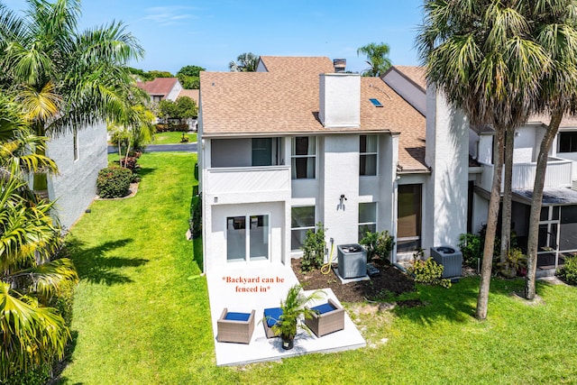 6734 Canary Palm Cir, Boca Raton, FL 33433 - view of front of house featuring stucco siding, a shingled roof, central AC, and a front lawn
