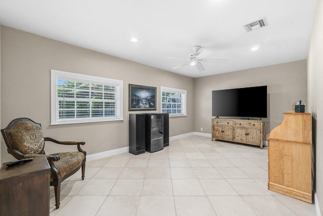 2070 NE 27th St, Lighthouse Point, FL 33064 - living area featuring healthy amount of natural light, a ceiling fan, and recessed lighting