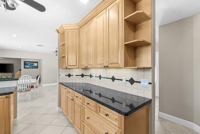 2070 NE 27th St, Lighthouse Point, FL 33064 - kitchen featuring open shelves, ceiling fan, light tile patterned flooring, backsplash, and light brown cabinetry