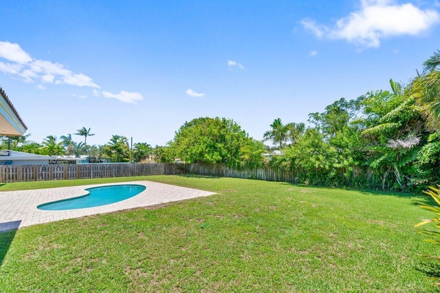 2070 NE 27th St, Lighthouse Point, FL 33064 - fenced backyard with a patio area