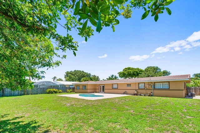 2070 NE 27th St, Lighthouse Point, FL 33064 - rear view of property with stucco siding, a patio area, and a fenced backyard
