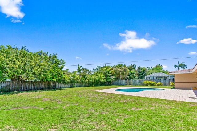 2070 NE 27th St, Lighthouse Point, FL 33064 - fenced backyard featuring a patio
