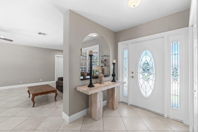 2070 NE 27th St, Lighthouse Point, FL 33064 - foyer entrance with light tile patterned floors and baseboards