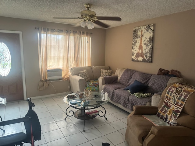 4601 Lake Ave, West Palm Beach, FL 33405 - tiled living room featuring cooling unit, a ceiling fan, and a textured ceiling