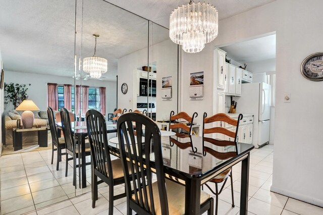 505 High Point Blvd N Unit A, Delray Beach, FL 33445 - dining area featuring a chandelier and light tile patterned floors