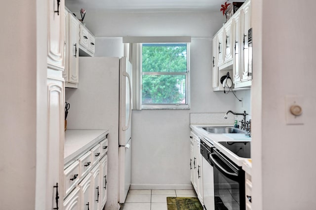 505 High Point Blvd N Unit A, Delray Beach, FL 33445 - kitchen with electric range, a sink, light countertops, and white cabinets