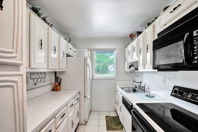 505 High Point Blvd N Unit A, Delray Beach, FL 33445 - kitchen featuring electric range oven, black microwave, a sink, white dishwasher, and light countertops