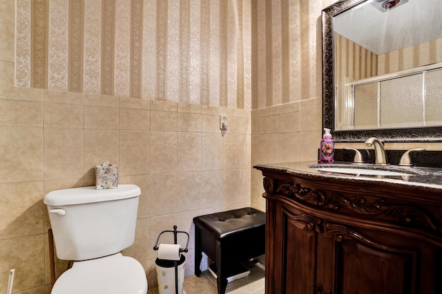 505 High Point Blvd N Unit A, Delray Beach, FL 33445 - bathroom featuring tile walls, vanity, toilet, wallpapered walls, and an enclosed shower