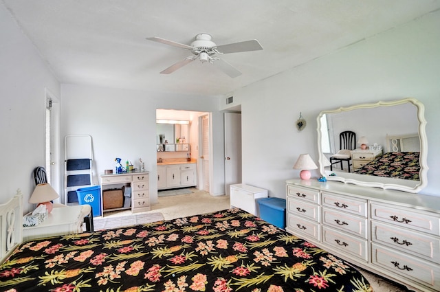 505 High Point Blvd N Unit A, Delray Beach, FL 33445 - bedroom featuring light colored carpet, ensuite bath, and a ceiling fan