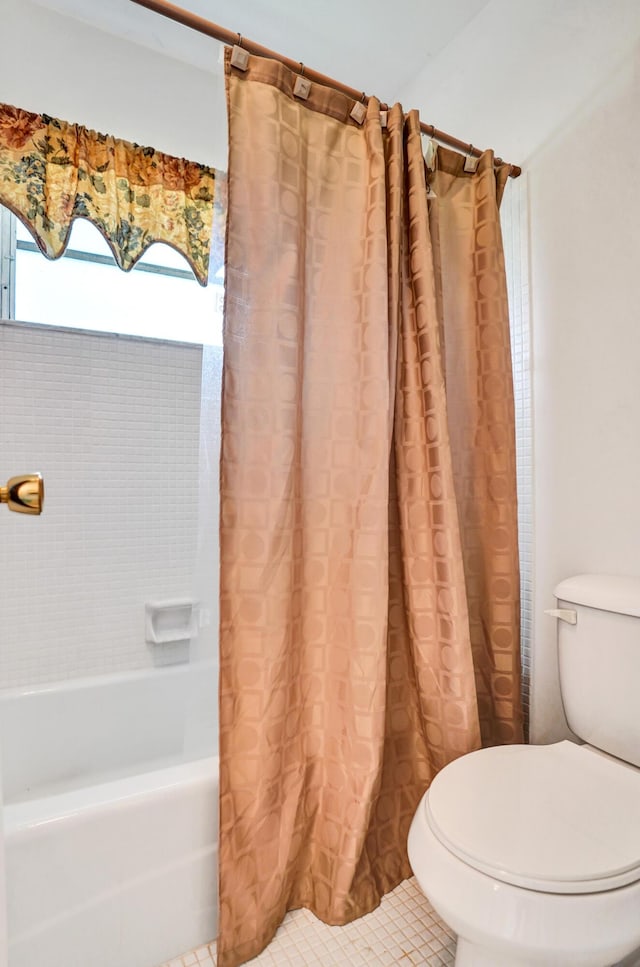 505 High Point Blvd N Unit A, Delray Beach, FL 33445 - full bathroom featuring toilet, shower / bathtub combination with curtain, and tile patterned flooring