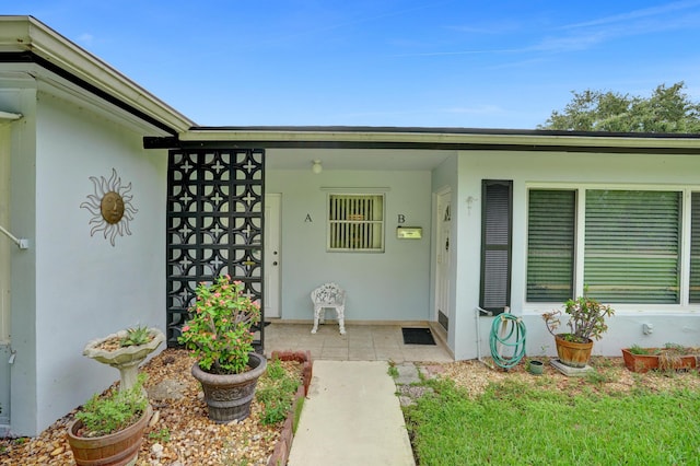 505 High Point Blvd N Unit A, Delray Beach, FL 33445 - doorway to property with stucco siding