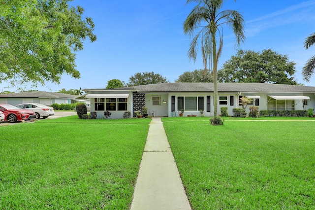 505 High Point Blvd N Unit A, Delray Beach, FL 33445 - single story home featuring a front lawn and stucco siding