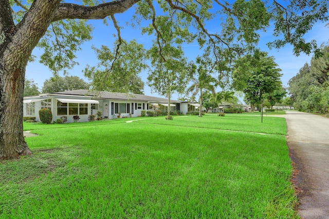 505 High Point Blvd N Unit A, Delray Beach, FL 33445 - view of front of house with a front lawn