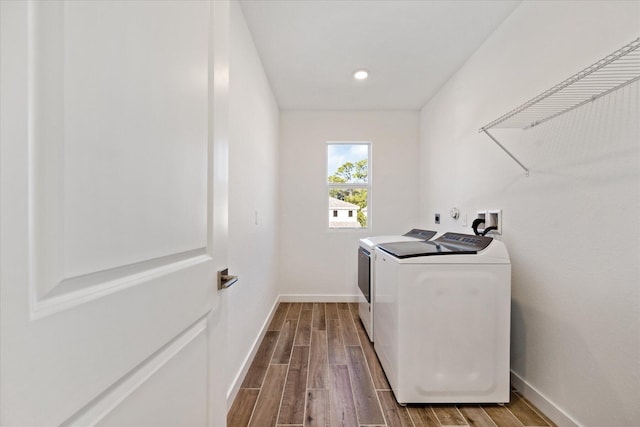 18478 Claybrook St, Jupiter, FL 33458 - laundry room with washer and dryer, dark wood-style floors, baseboards, and recessed lighting