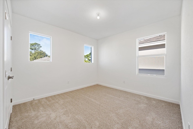 18478 Claybrook St, Jupiter, FL 33458 - empty room featuring carpet and baseboards