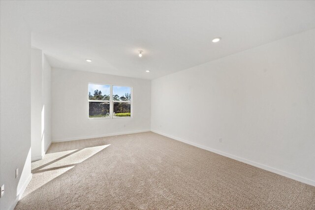 18478 Claybrook St, Jupiter, FL 33458 - empty room featuring light colored carpet, baseboards, and recessed lighting