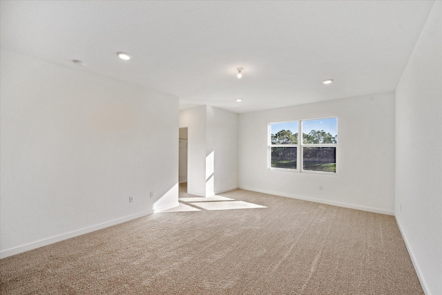 18478 Claybrook St, Jupiter, FL 33458 - unfurnished room featuring light carpet, baseboards, and recessed lighting