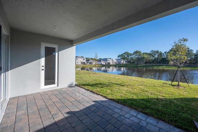 18478 Claybrook St, Jupiter, FL 33458 - view of patio featuring a water view