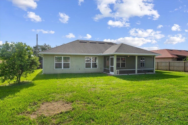 3650 SW Parsons St, Port Saint Lucie, FL 34953 - back of house featuring a sunroom, stucco siding, and roof with shingles