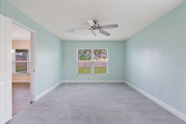 3650 SW Parsons St, Port Saint Lucie, FL 34953 - empty room with ceiling fan, carpet floors, and baseboards