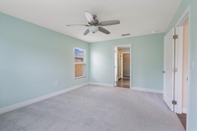 3650 SW Parsons St, Port Saint Lucie, FL 34953 - unfurnished bedroom featuring carpet flooring, baseboards, and a ceiling fan