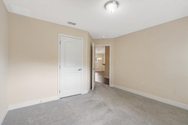 3650 SW Parsons St, Port Saint Lucie, FL 34953 - unfurnished bedroom with light colored carpet and baseboards