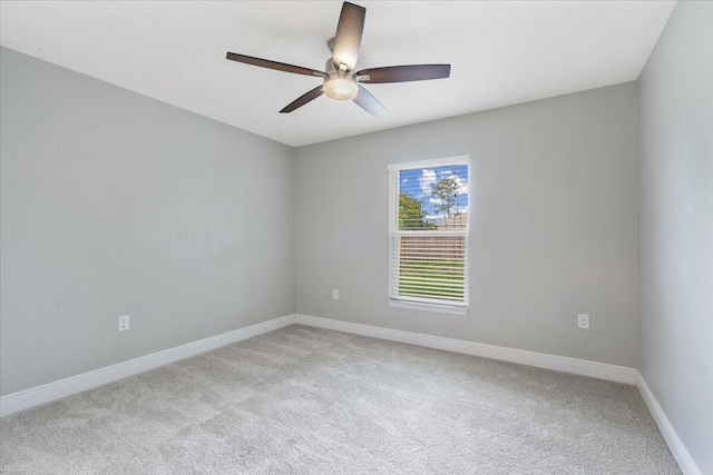 3650 SW Parsons St, Port Saint Lucie, FL 34953 - empty room with light carpet, ceiling fan, and baseboards