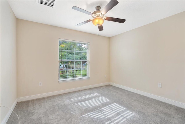 3650 SW Parsons St, Port Saint Lucie, FL 34953 - carpeted spare room with baseboards and a ceiling fan