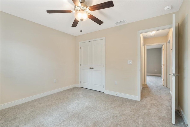3650 SW Parsons St, Port Saint Lucie, FL 34953 - unfurnished bedroom featuring light colored carpet, baseboards, a closet, and ceiling fan