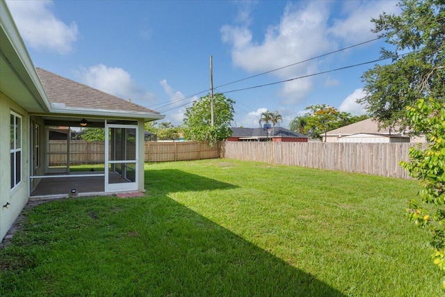 3650 SW Parsons St, Port Saint Lucie, FL 34953 - view of yard featuring a sunroom