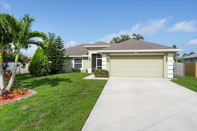 3650 SW Parsons St, Port Saint Lucie, FL 34953 - single story home with stucco siding, an attached garage, driveway, and roof with shingles