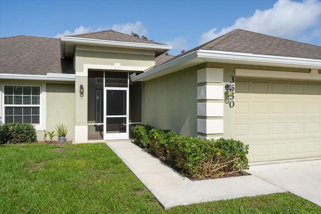 3650 SW Parsons St, Port Saint Lucie, FL 34953 - doorway to property featuring stucco siding, an attached garage, roof with shingles, and a yard