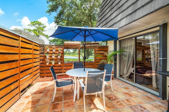 125 1st Ter, Palm Beach Gardens, FL 33418 - view of patio featuring outdoor dining area