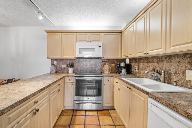 125 1st Ter, Palm Beach Gardens, FL 33418 - kitchen featuring white appliances, a textured ceiling, backsplash, light brown cabinetry, and light tile patterned flooring