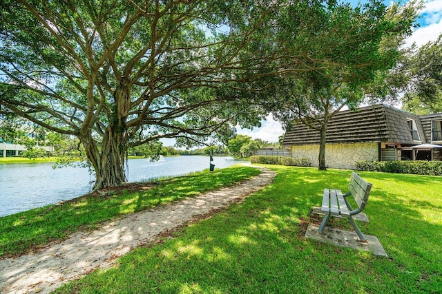 125 1st Ter, Palm Beach Gardens, FL 33418 - view of grassy yard with a water view