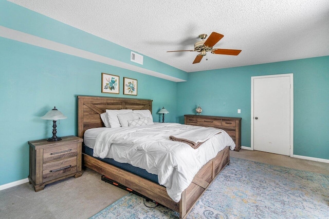 125 1st Ter, Palm Beach Gardens, FL 33418 - bedroom featuring carpet, a textured ceiling, and a ceiling fan