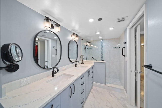 8750 S Ocean Dr Unit 731, Jensen Beach, FL 34957 - bathroom featuring double vanity, a shower stall, marble finish floors, and recessed lighting