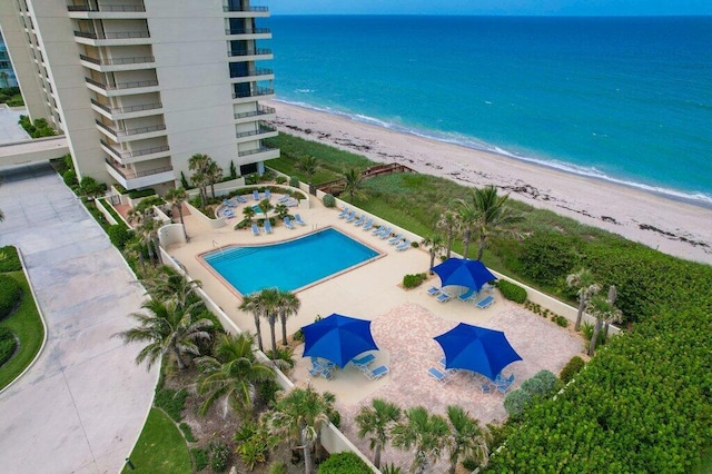 8750 S Ocean Dr Unit 731, Jensen Beach, FL 34957 - bird's eye view of expansive beach and a pool area