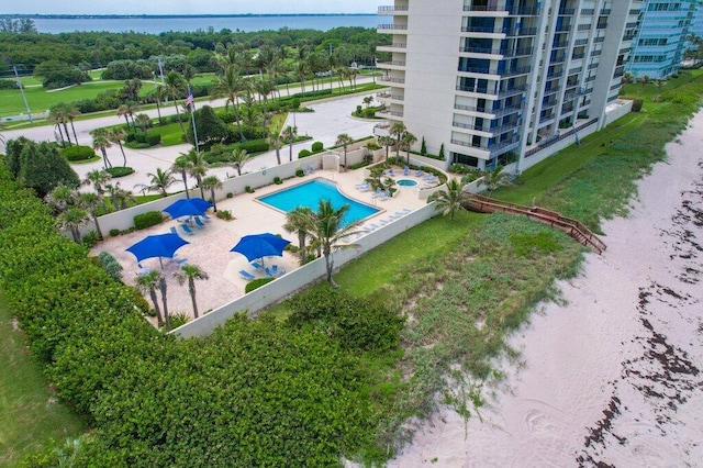 8750 S Ocean Dr Unit 731, Jensen Beach, FL 34957 - bird's eye view of a pool area, a nearby body of water, and apartment complex / building