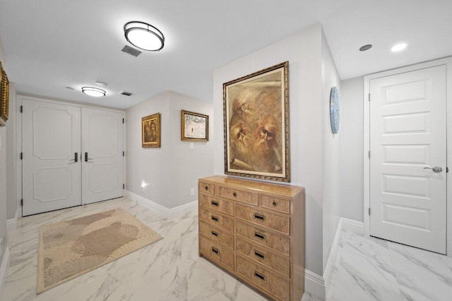8750 S Ocean Dr Unit 731, Jensen Beach, FL 34957 - foyer featuring baseboards and light marble finish flooring