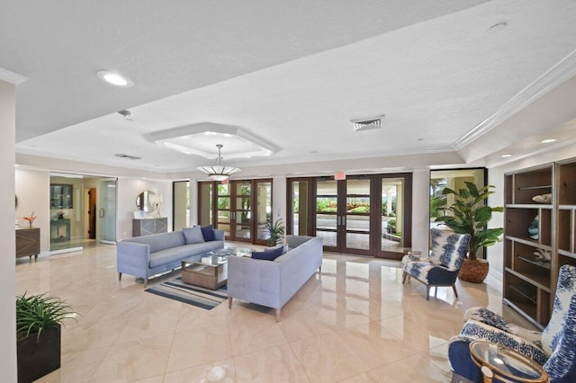 8750 S Ocean Dr Unit 731, Jensen Beach, FL 34957 - living room with crown molding, french doors, a raised ceiling, recessed lighting, and a textured ceiling